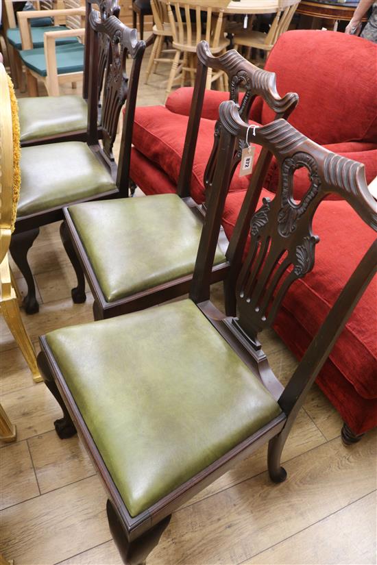 A set of four 1920s Chippendale style mahogany dining chairs